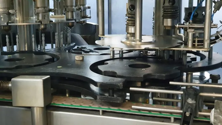 Star wheels and guides running on a bottle filling line