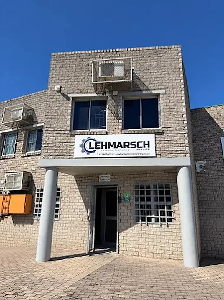 The Lehmarsch workshop building in Triangle Park, Paarl, with the Lehmarsch sign above the entrance